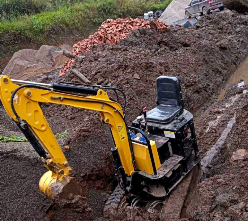 Crawler excavator working in narrow and muddy ditches