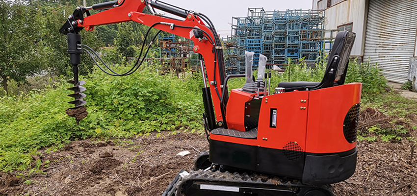 Small excavator equipped with spiral drill